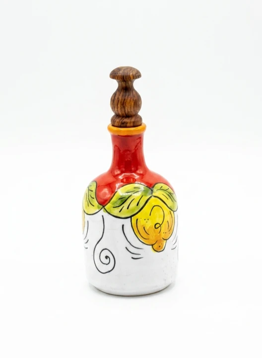 buteleczka ceramiczna na oliwe z motywem cytryny czerwona tlo.png